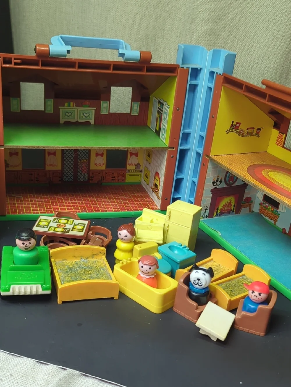 B) Fisher-Price Tudor House #952 brown & white, 2-story house complete w/Nursery
